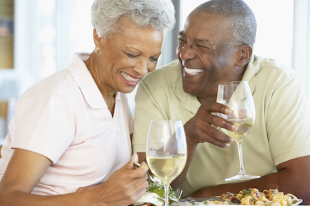 couple smiling after restorative dental treatment