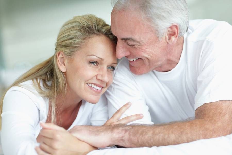 couple with dentures smiling together